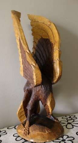 A fabulous, large hand carved detailed two toned wood eagle. Stunning feature display piece!!!