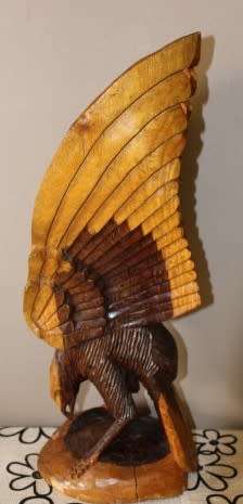 A fabulous, large hand carved detailed two toned wood eagle. Stunning feature display piece!!!