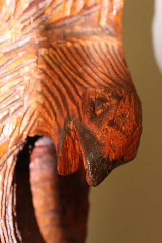 An exquisite, tall hand carved, detailed free standing wood eagle. Stunning feature display piece!