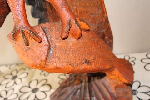 An exquisite, tall hand carved, detailed free standing wood eagle. Stunning feature display piece!