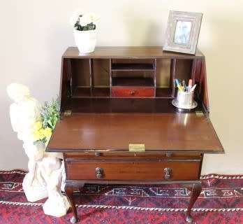 An elegant vintage fall-top writing bureau with pigeon holes and three spacious drawers. Beautiful!!
