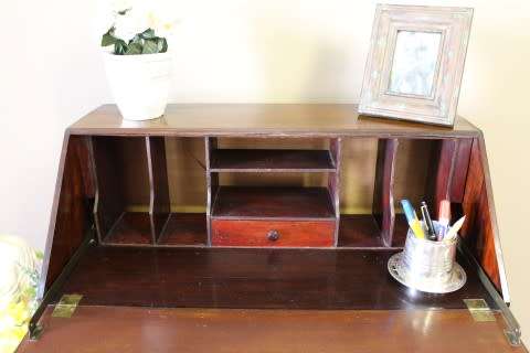 An elegant vintage fall-top writing bureau with pigeon holes and three spacious drawers. Beautiful!!