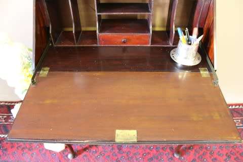 An elegant vintage fall-top writing bureau with pigeon holes and three spacious drawers. Beautiful!!