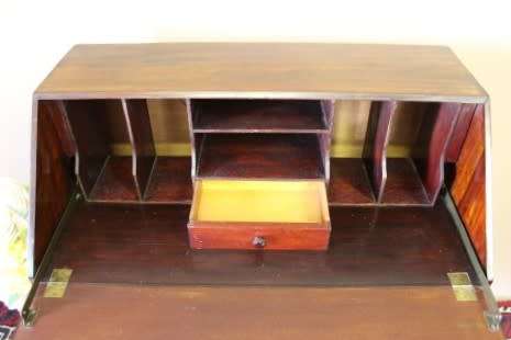 An elegant vintage fall-top writing bureau with pigeon holes and three spacious drawers. Beautiful!!