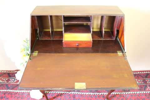 An elegant vintage fall-top writing bureau with pigeon holes and three spacious drawers. Beautiful!!