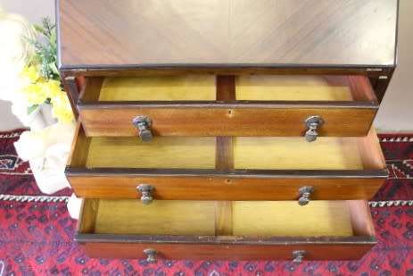 An elegant vintage fall-top writing bureau with pigeon holes and three spacious drawers. Beautiful!!