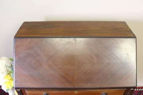 An elegant vintage fall-top writing bureau with pigeon holes and three spacious drawers. Beautiful!!