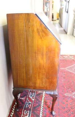 An elegant vintage fall-top writing bureau with pigeon holes and three spacious drawers. Beautiful!!