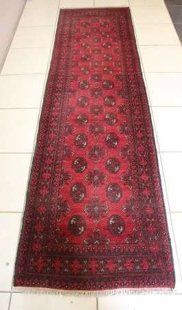 A stunning vintage Persian Afghan Bokara runner carpet (279cm long) in good condition. Fabulous!!!