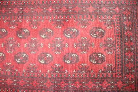 A stunning vintage Persian Afghan Bokara runner carpet (279cm long) in good condition. Fabulous!!!