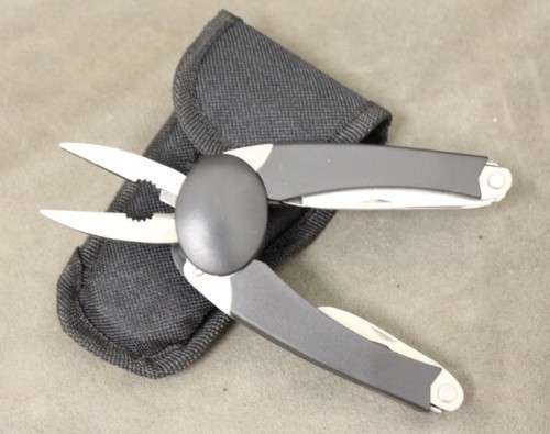 An awesome compact Rostfrei multi tool in its original pouch (brand new) price/multi tool.