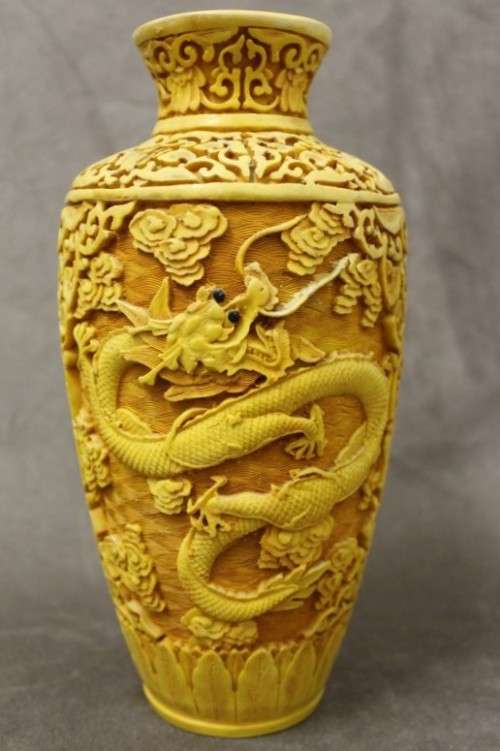 A beautiful vintage carved Cinnabar vase with a dragon theme. Perfect as a feature vase!!