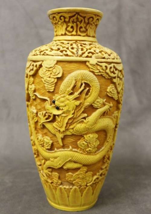 A beautiful vintage carved Cinnabar vase with a dragon theme. Perfect as a feature vase!!