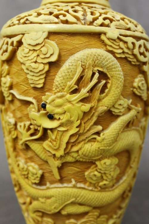 A beautiful vintage carved Cinnabar vase with a dragon theme. Perfect as a feature vase!!