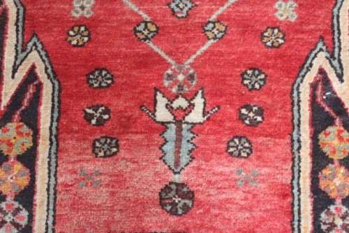 A stunning 125cm x 210cm hand knotted Persian carpet in bright reds. Gorgeous in all rooms!