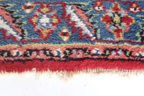 A stunning 95cm x 153cm hand knotted thick pile Persian carpet in dark reds. Gorgeous in all rooms!