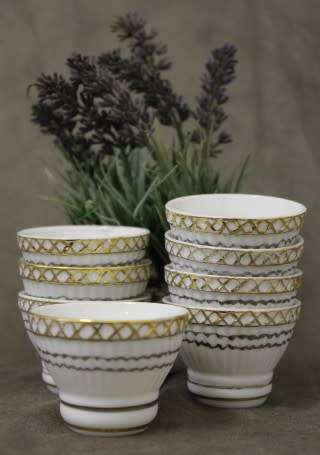 A very pretty traditional Chinese rice wine set of 8 cups with silver and gold gilt.