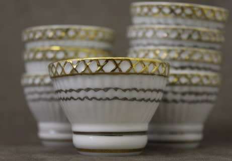 A very pretty traditional Chinese rice wine set of 8 cups with silver and gold gilt.