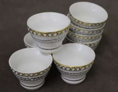 A very pretty traditional Chinese rice wine set of 8 cups with silver and gold gilt.