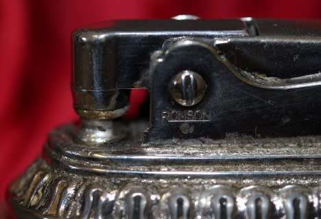 A spectacular vintage (1949) silver plated Ronson 'Queen Anne' table lighter, made in England.