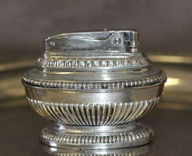 A spectacular vintage (1949) silver plated Ronson 'Queen Anne' table lighter, made in England.