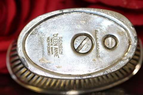 A spectacular vintage (1949) silver plated Ronson 'Queen Anne' table lighter, made in England.