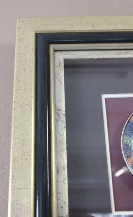 A gorgeous hand painted oriental "Imari" decorative porcelain plate in a box frame behind glass.