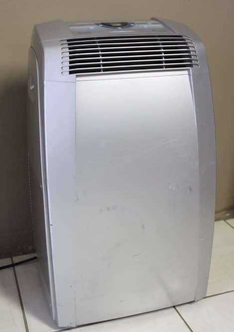 A fantastic De Longhi Pinguino PAC C110 portable air conditioner in full working order.