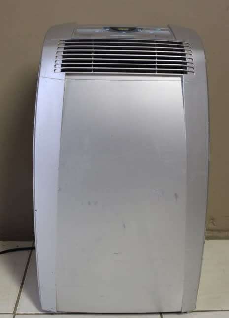 A fantastic De Longhi Pinguino PAC C110 portable air conditioner in full working order.