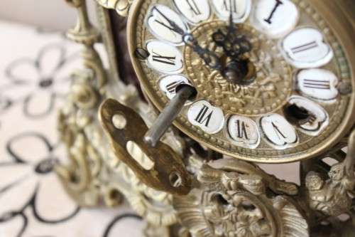A remarkable vintage French solid brass Horseman mantle clock with Roman numerals