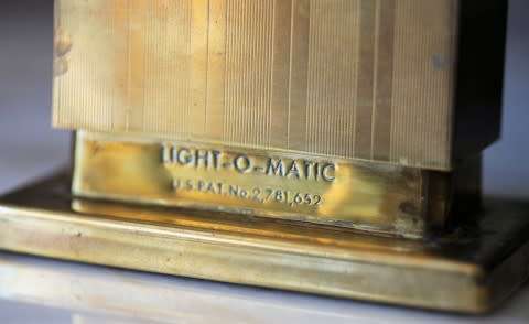 A beautiful, vintage (1950) gold plated, West German, Augusta Patent 'light-o-matic' table lighter.