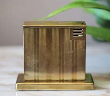 A beautiful, vintage (1950) gold plated, West German, Augusta Patent 'light-o-matic' table lighter.