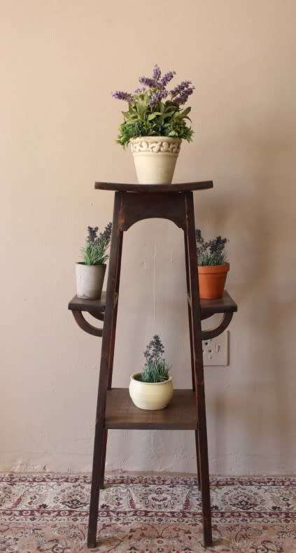 A gorgeous vintage dark Oak four tier planter/ display stand! Stunning indoors or on the patio!!
