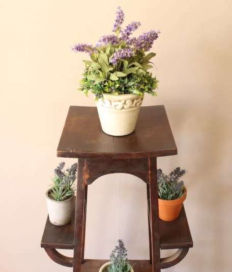 A gorgeous vintage dark Oak four tier planter/ display stand! Stunning indoors or on the patio!!