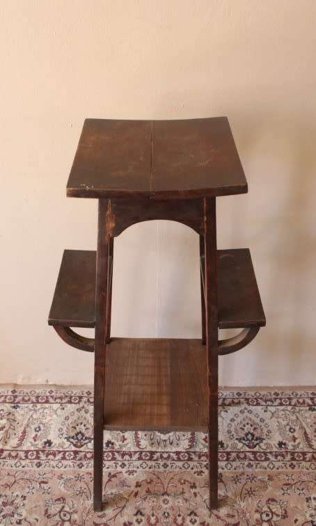 A gorgeous vintage dark Oak four tier planter/ display stand! Stunning indoors or on the patio!!