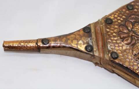 A gorgeous vintage fire bellow, made of copper. Perfect for display, in working condition.