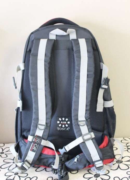 An awesome red and black Tosca backpack in great condition!!