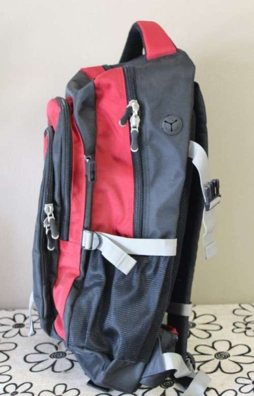 An awesome red and black Tosca backpack in great condition!!