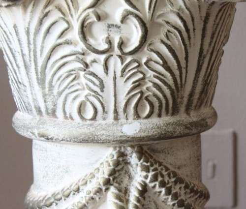 A stylish glass top hall table with two roped pillars. Stunning in all living areas!!!.