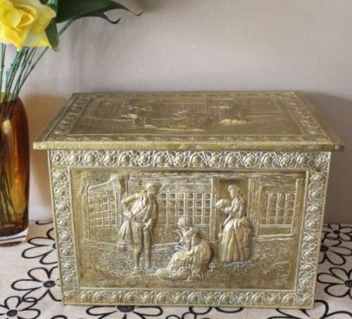 An awesome vintage coal box with incredible solid brass covering!! Stunning indoors/outdoors!!