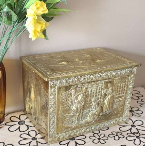 An awesome vintage coal box with incredible solid brass covering!! Stunning indoors/outdoors!!