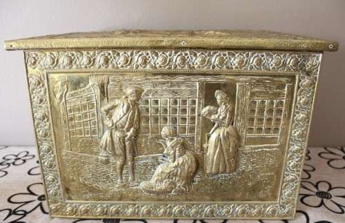 An awesome vintage coal box with incredible solid brass covering!! Stunning indoors/outdoors!!