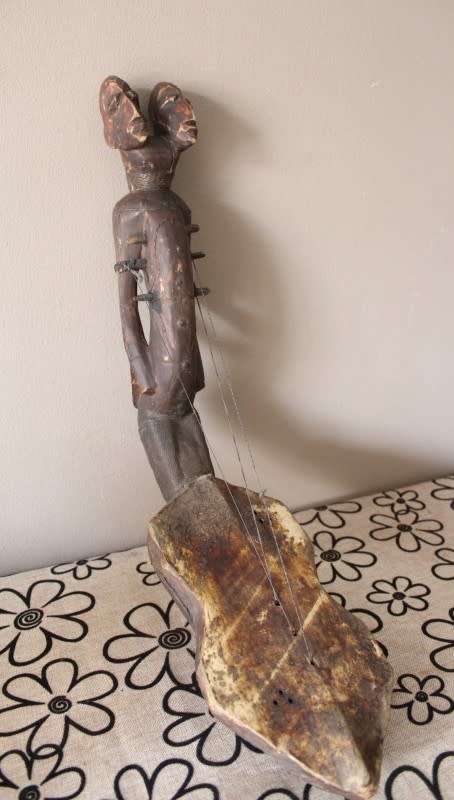 A stunning hand carved traditional DRC Zande style bow harp. WOW!! Lifestyle Sale