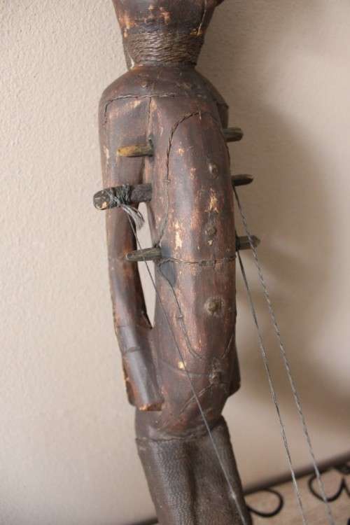 A stunning hand carved traditional DRC Zande style bow harp. WOW!! Lifestyle Sale