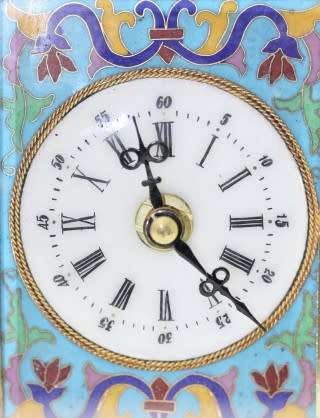 A stunning Junghans quartz table clock made of brass and blue enamel, styled with a gorgeous pattern