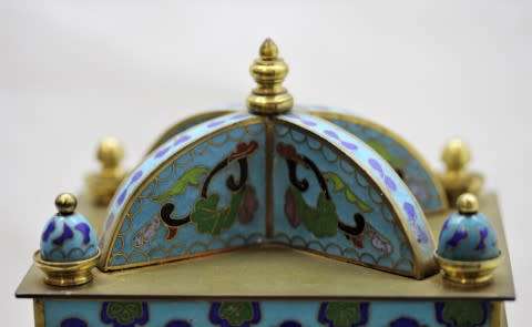 A stunning Junghans quartz table clock made of brass and blue enamel, styled with a gorgeous pattern