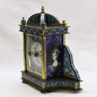 A stunning Junghans quartz table clock made of brass and blue enamel, styled with a gorgeous pattern