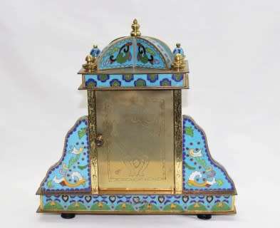 A stunning Junghans quartz table clock made of brass and blue enamel, styled with a gorgeous pattern