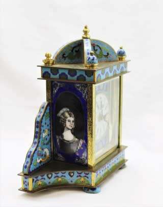 A stunning Junghans quartz table clock made of brass and blue enamel, styled with a gorgeous pattern
