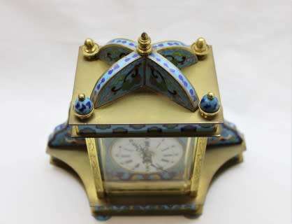 A stunning Junghans quartz table clock made of brass and blue enamel, styled with a gorgeous pattern